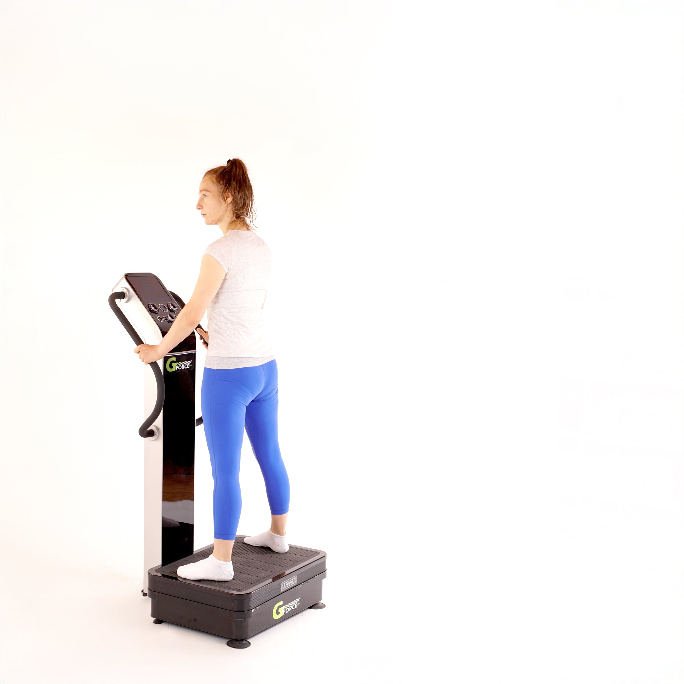 Woman on GForce Whole Body Vibration Machine