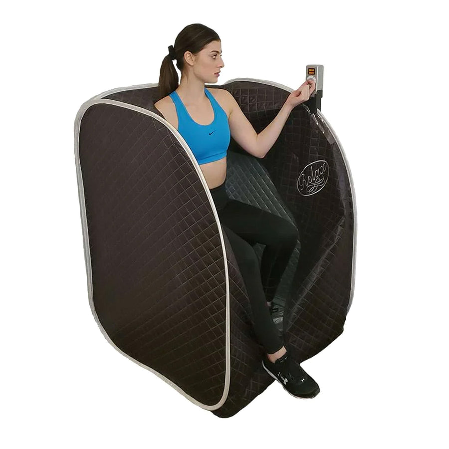 Black Relax Low EMF Far Infared Sauna with a lady in it