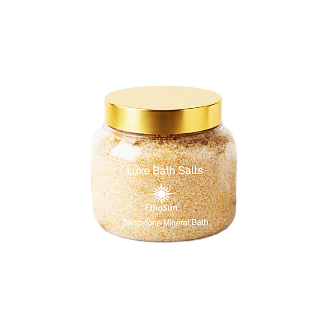 Jar of Luxe Bath Salts with a gold lid on a white background