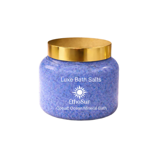 Jar of Luxe Bath Salts with gold lid on a white background