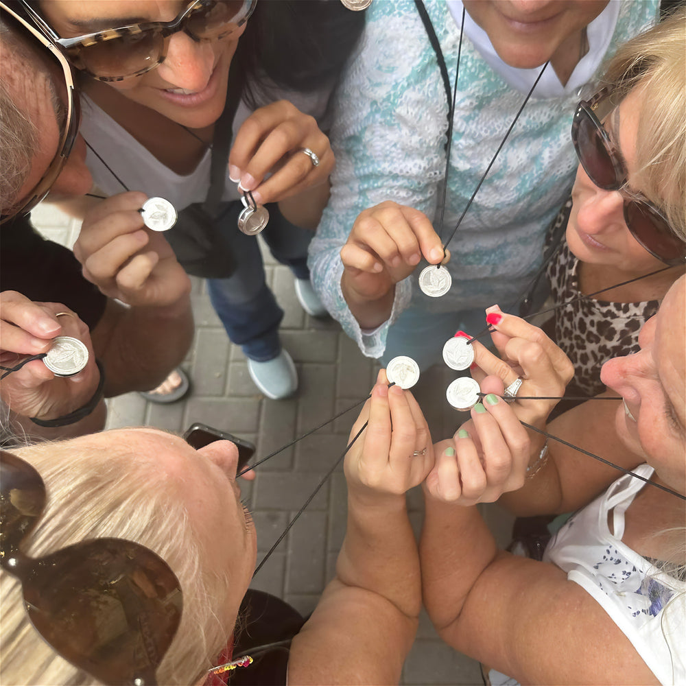People showing their Terra Pendant