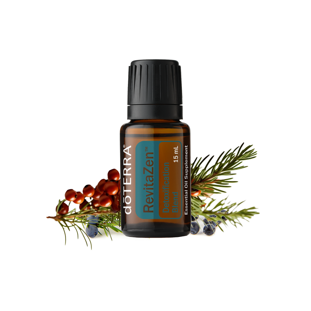 doTERRA RevitaZen Detoxification Blend 15 ml bottle with natural elements on a white background