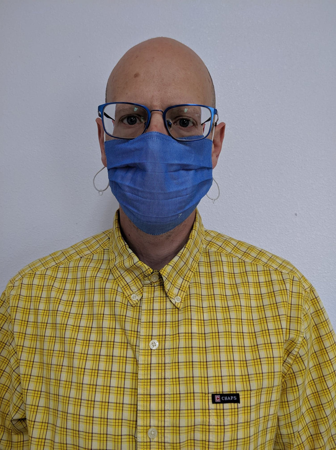 man wearing reversible face mask